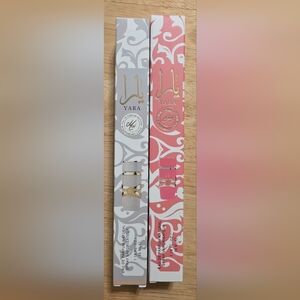 Ara women's perfume roller - pink and gray with gold trim